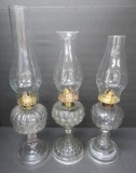 Three patterned oil lamps, 8