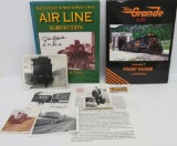 Two hardcover train books, one signed, with real photos