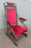 Early Rocking Chair with unusual cast iron arm supports