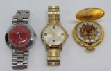 Three Caravelle watches, two wrist watches (one with red face) and one pocket watch