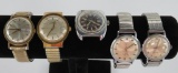 Five vintage Timex men's wrist watches, four with stretch bands