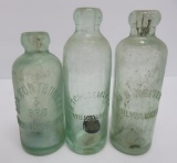 Three Milwaukee Hutchinson bottles, aqua