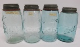 Four quart Mason Ball Jars, four different markings