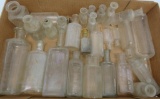 27 clear medicine and extract style bottles, 2