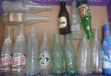 14 embossed and ACL soda bottles