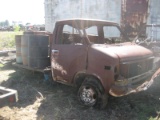 Chevy Flatbed w/ Twelve 55-gal Drums