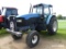 New Holland TM125 Tractor, s/n 095417B: Cab, 2wd, Power Shift, Left Hand Re