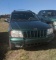 1999 Jeep Grand Cherokee, s/n 1J4GW68N1XC647509, Showing 147K mi.