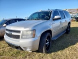 2010 Chevy Suburban s/n 1GNVCHE03AR243208, Showing 218,528mi.