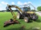New Holland 7740 Tractor, s/n 071486B: C/A, 2wd, Alamo Side Boom Mower, Met