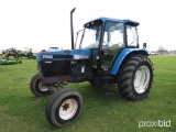 New Holland 7740 Tractor, s/n 028489B: 2wd, Encl. Cab, Meter Shows 7046 hrs