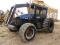 New Holland TB120 Tractor, s/n B85677M: Forestry Pkg.