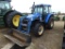 New Holland TS110 MFWD Tractor, s/n 159969B: Encl. Cab, Loader, Meter Shows