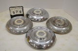 Set Of 4 - 1955 Olds Hub Caps, 1 W/ Dent