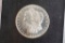 1884-CC: MS-60, Morgan Silver Dollar: NGC Graded