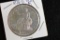 1875-S: Trade Dollar, Morgan Silver Dollar