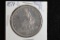 1877-S: Trade Dollar, Morgan Silver Dollar