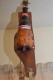 Leather Holster with Budweiser Stamped into the Leather, Holding Full Bottl