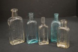 Group of old Advertising Bottles