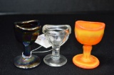 3 Eye Wash Cups: Orange Slag, Clear, Purple Carnival