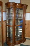 Serpentine Front Cherry Wood (type) Display Cabinet, Mirrored Back,  6 Glass Shleves, Lighted