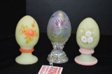 3 Plain Base Eggs: 2 Hand painted and Signed, 1 Frosted Hand painted and Si