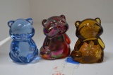Pair of Fenton Racoon Paperweights: 1 Carnival, 1 Amber Hand painted and Si
