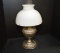 B and H Ornate Metal Base Oil Lamp w/ Milk Glass Shade and Chimney