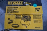 DeWalt 6 Gallon 165 Max PSI air compressor with a Brad Nailer with hose