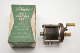 J.C. Higgins Bait Casting Reel In Box With Fishing Line On It