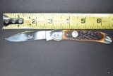 Queen Steel #94, Single Blade, Locking Push Button, Manmade Stag Handle