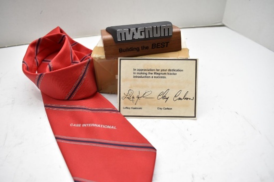 Magnum Building the Best Desk Paper weight and Red Case International Tie