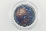 1900 Rainbow Morgan Silver Dollar