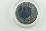 1883 Rainbow Morgan Silver Dollar