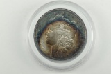 1884 Rainbow Morgan Silver Dollar