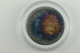 1879 Rainbow Morgan Silver Dollar