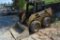 John Deere 6675 Skid steer Gas, equipped w/ 65” bucket, fair rubber, used f