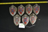 Seven Knight Shield emblems, some have cracks
