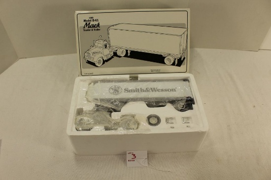 1960 Model B-61 Mack Tractor & Trailer 1:34 scale, with "Smith & Wesson" printed on trailer, stockk