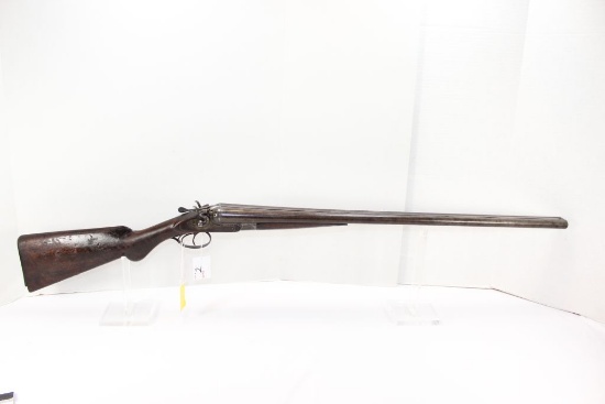 The International Double Barrel Shotgun, Damascus Steel, hammer set double trigger, left barrel has