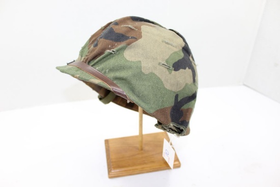 WWII Steel helmet with Kevlar liner, headband, and cloth camouflage outer cover