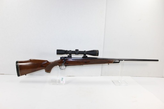 Winchester Model 70 7mm Remington Mag; Checkered Walnut Stock w/Leopold Rifleman 3x9x40 Scope and Mo