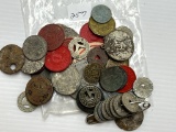 Bag of Tokens mad Metals, including Tax Tokens, Good For's, Transportation, Amusement, and a Wooden