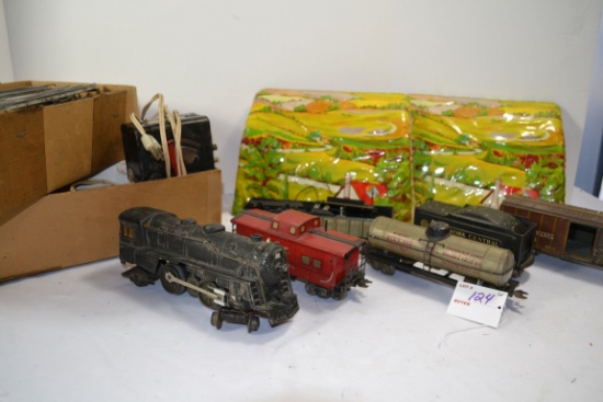 Vintage Train Set by Marx Toys including Engine, Cars, Transformer, Track, and Metal Litho Tunnel