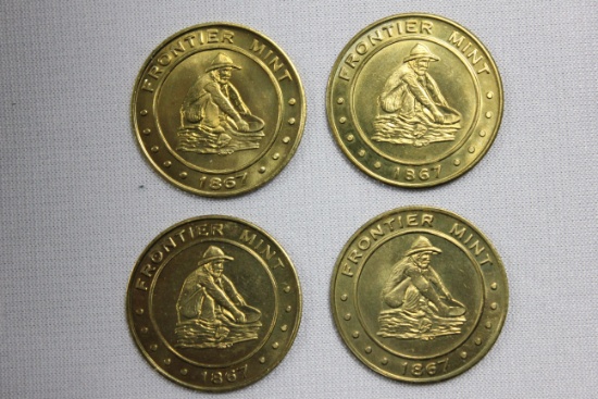 Group of 4 - Frontier Mint Territory Commemorative Coins