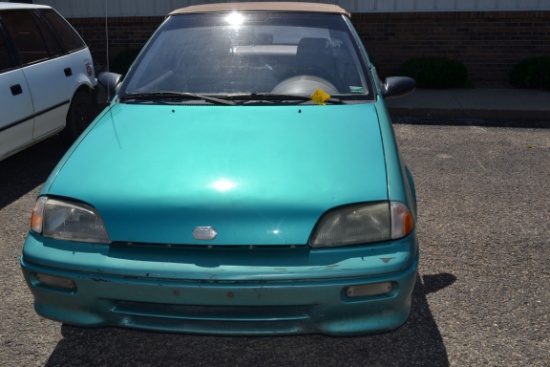 1993 Geo Metro Convertible; New Top; A/C Works; 5-Speed Transmission; Approx. 21,400 miles; 3-Cylind