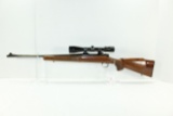 Remington Model 700 .243 Win. Cal. Bolt Action Rifle w/Jeweled Bolt and Redfield Tracker 3-9x40? Sco