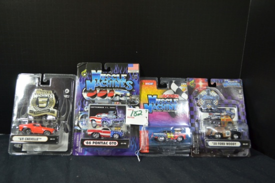 Group of 4 Muscle Machines including '50 Ford Woody, '66 Pontiac GTO, '69 Chevelle, and No. 24 DuPon