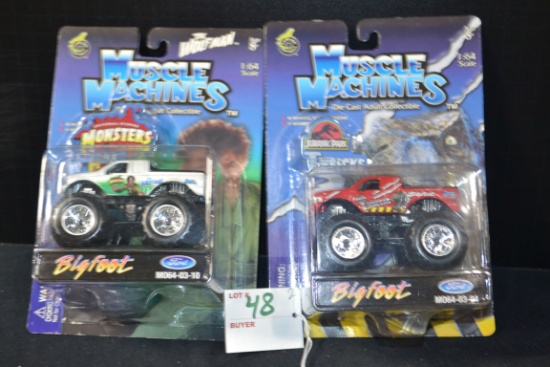 Pair of Muscle Machine Adult Collectibles of The Wolf Man and Jurassic Park Monster Trucks; 1/64 Sca