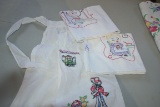 Group of Hand-Embroidered Tea Towels and Apron
